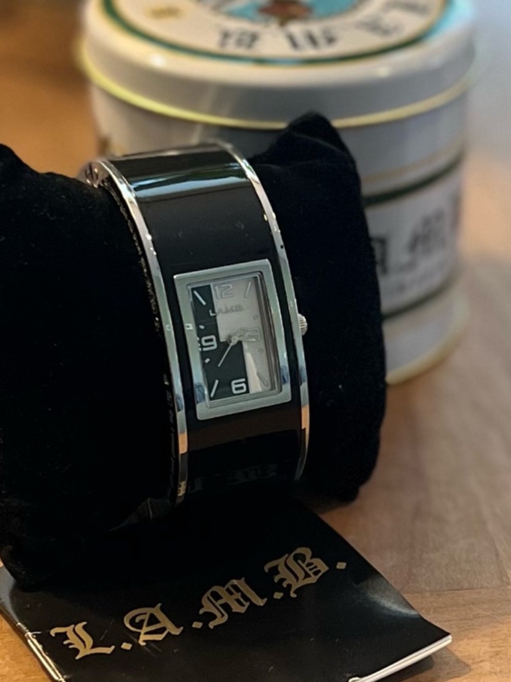 L.A.M.B. Black and Silver Bangle Watch